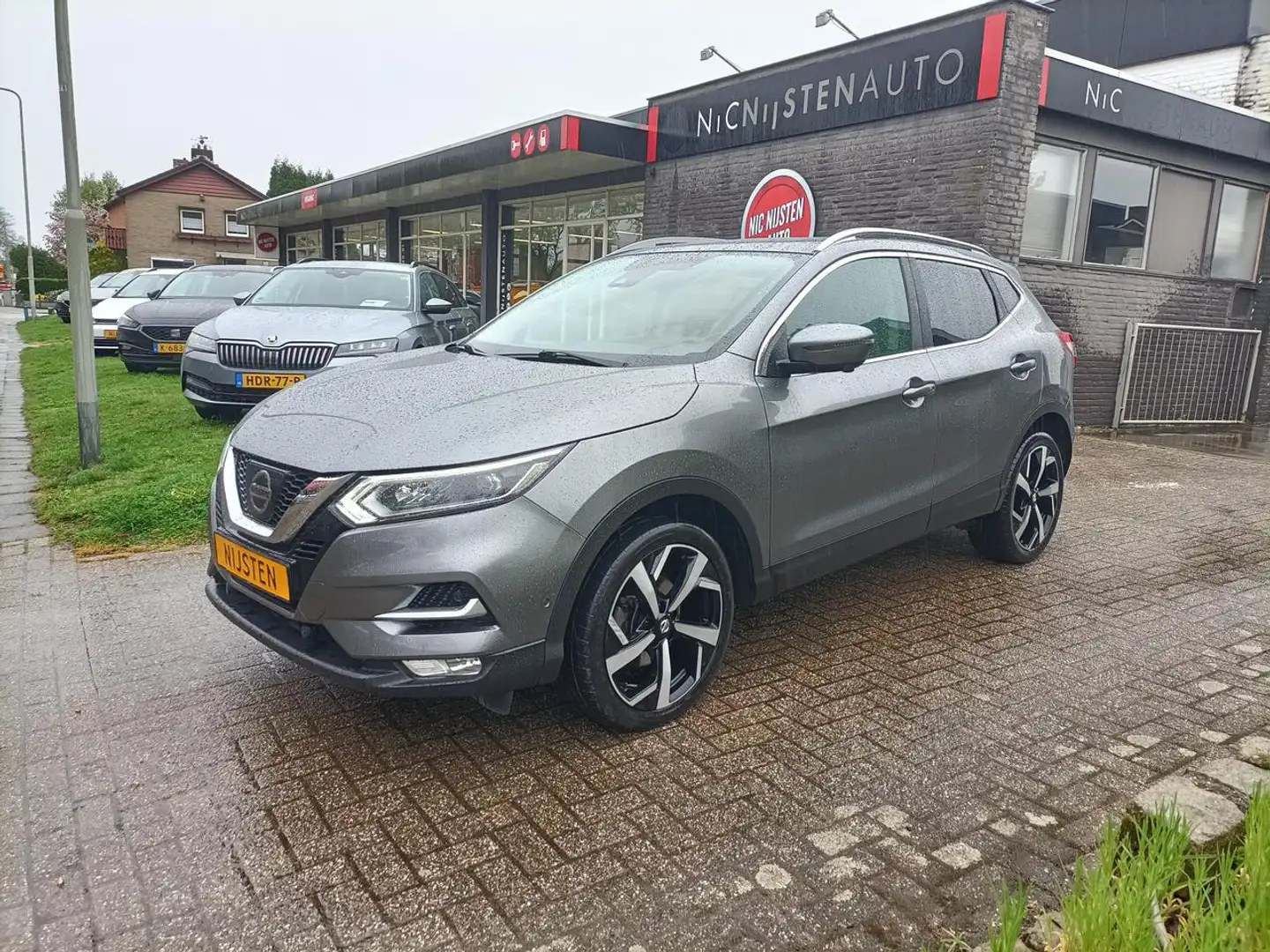 Nissan Qashqai 1.2 DIG-T Tekna Pano,Cruise,Navi,Voorruitvw Grijs - 1