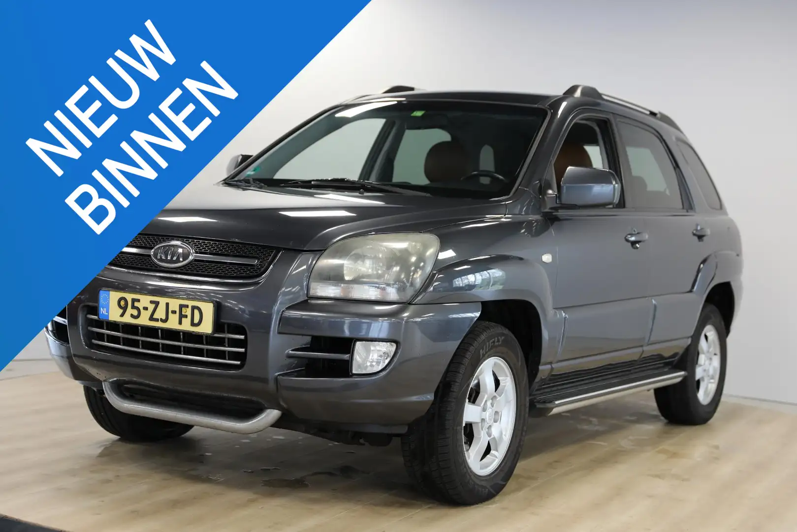 Kia Sportage 2.0 CVVT X-ception | Leer | Cruise | Stoelverwarmi Gris - 1