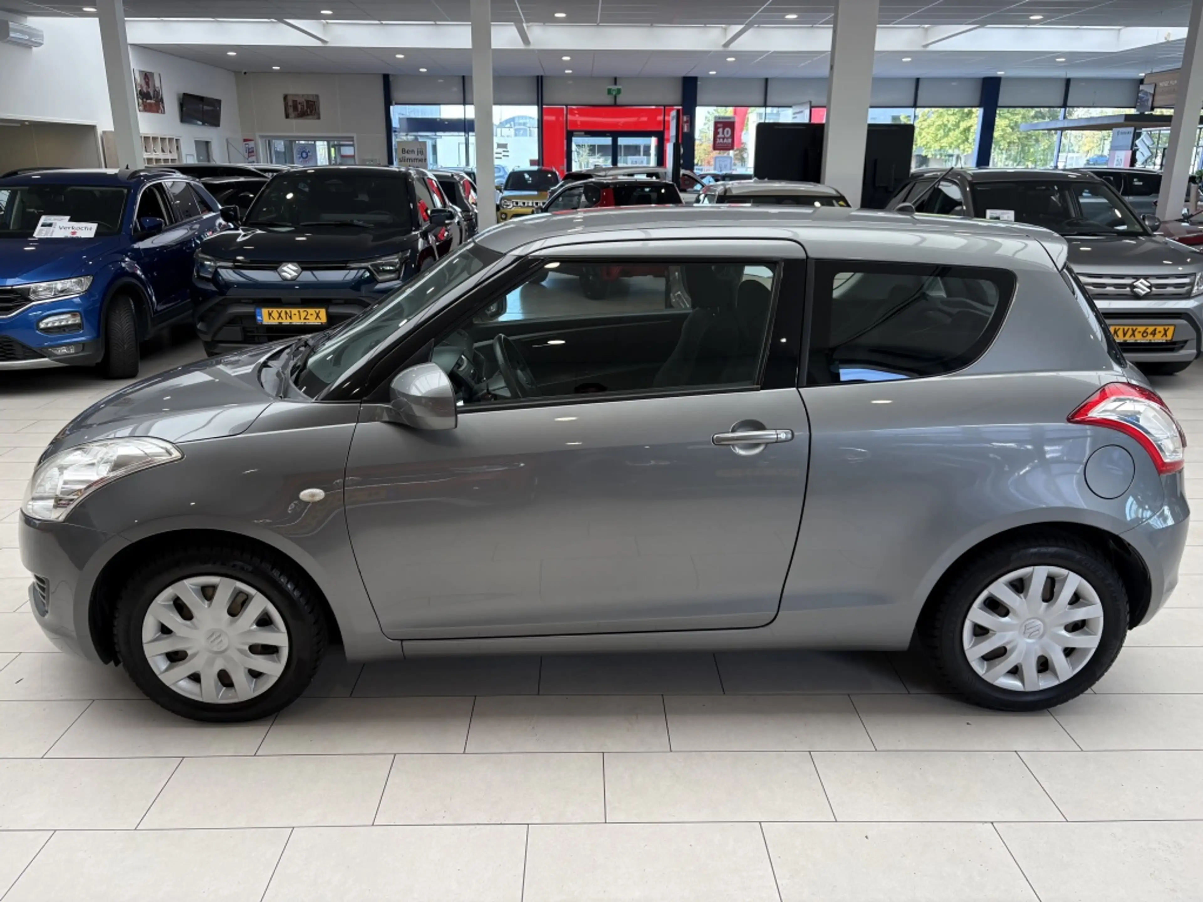 Suzuki Swift 1.2 Comfort [ TREKHAAK I ALL SEASON I STOELVERWARM — photo 7