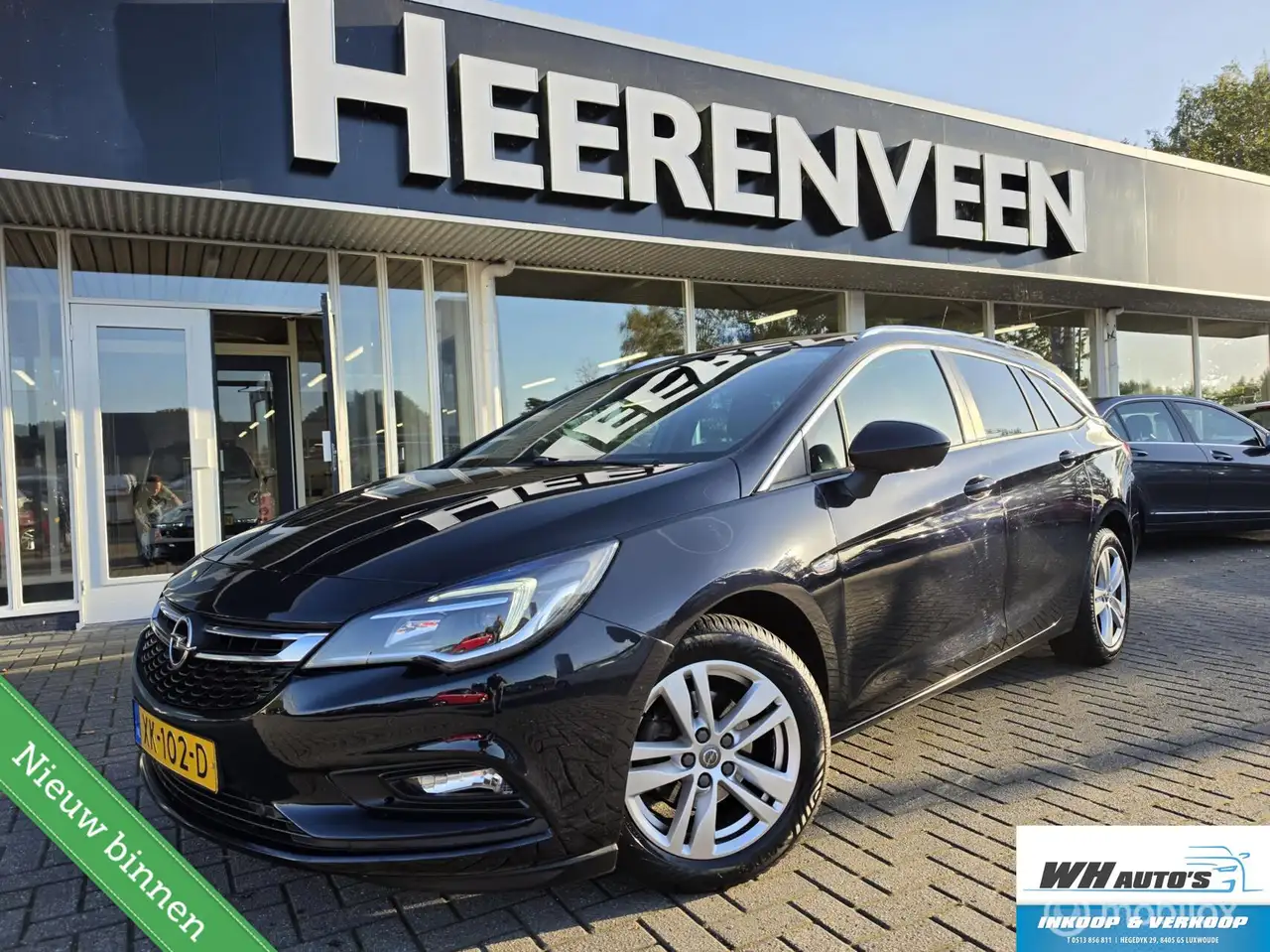 Opel Astra Sports Tourer 1.0 Business+ — photo 1 of 15