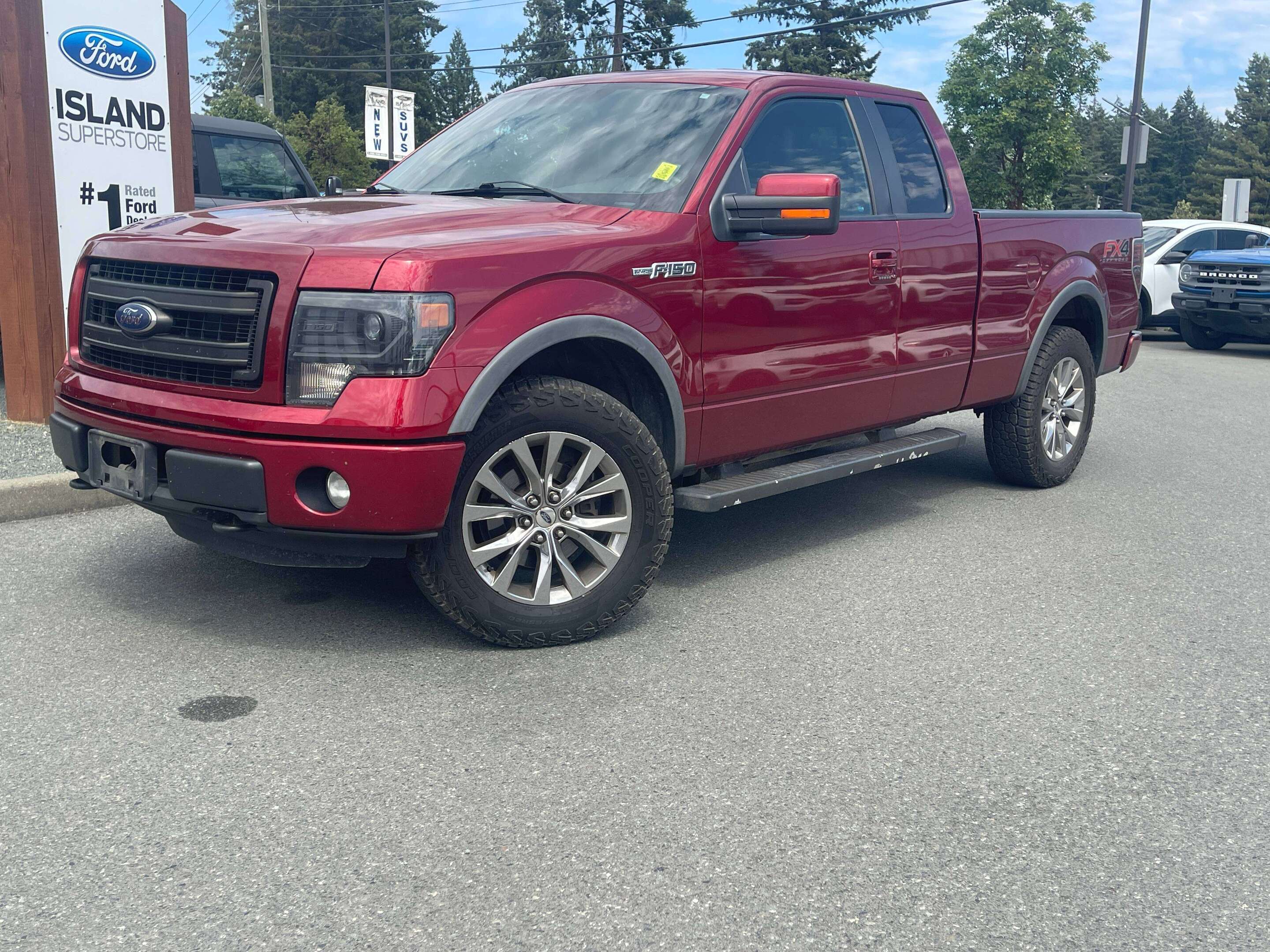 Red 2013 Ford F-150 Pickup Truck Four-Wheel Drive Automatic