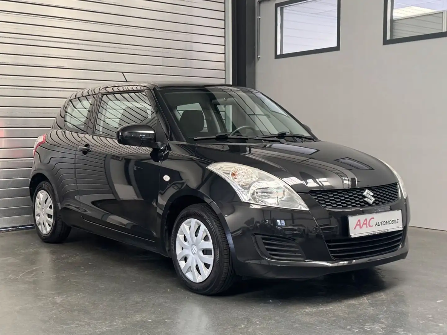 Suzuki Swift 1,2 / Klima / 8-fach bereift Schwarz - 1