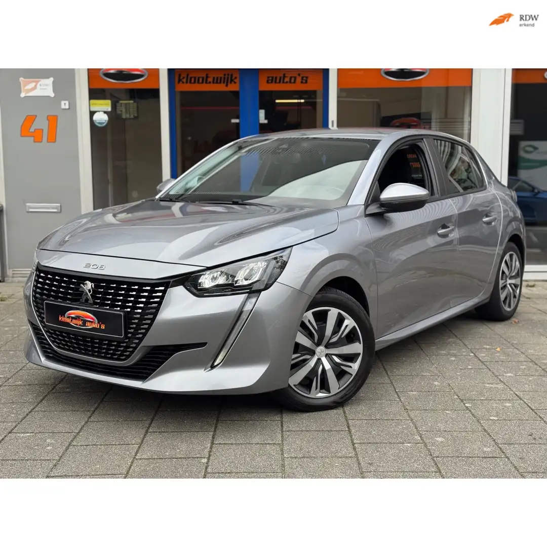 Peugeot 208 1.2 P.Tech Allure CarPlay Navigatie Cruise LED Bj. Grau - 1