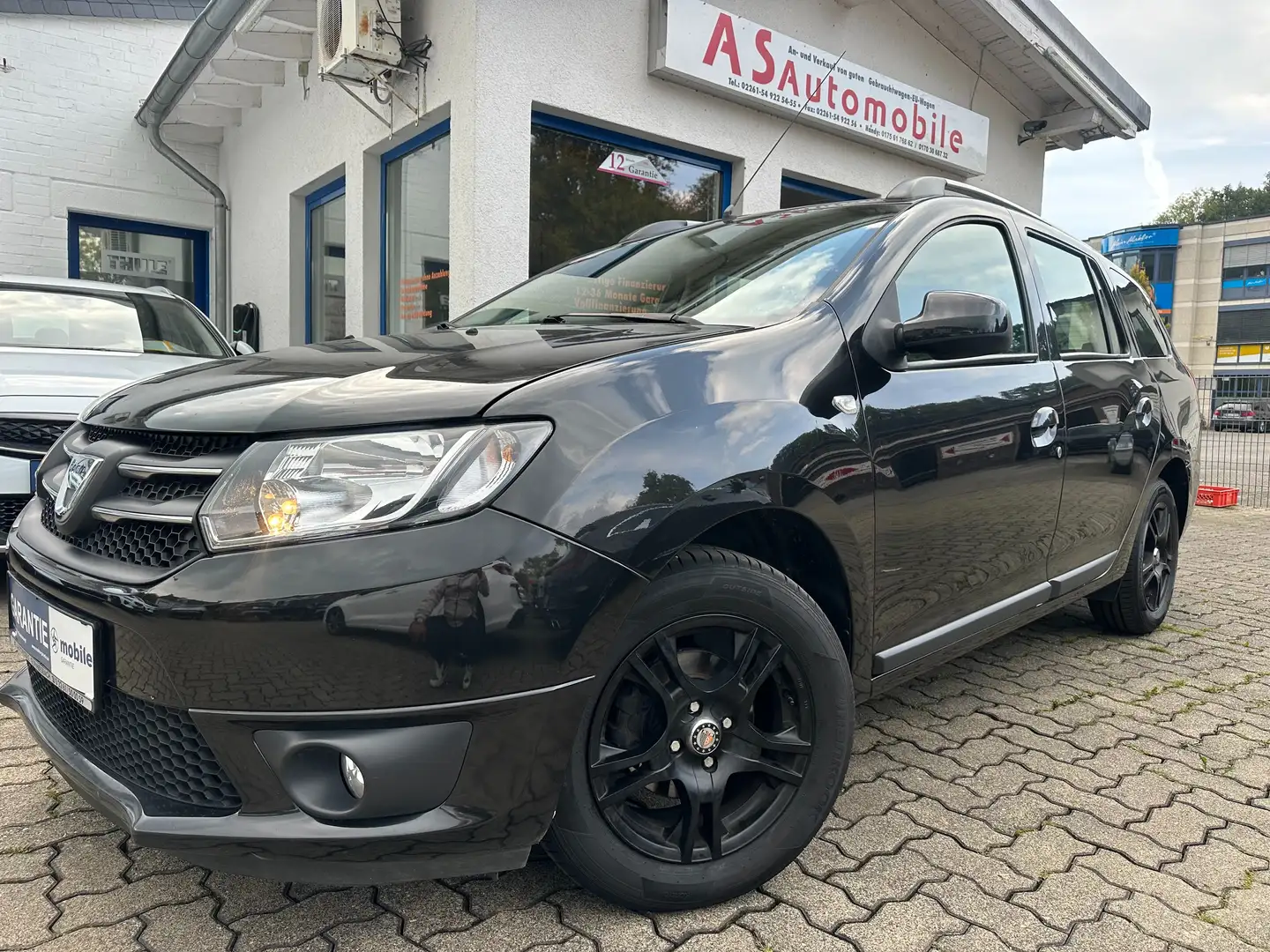 Dacia Logan MCV 1.0 TCe Prestige+1.HAND+NAVI+KLIMA+PDC+EURO 5 Schwarz - 1