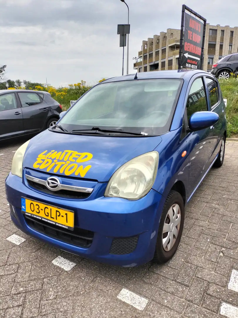 Daihatsu Cuore Cuore 1.0 Premium Синій - 1
