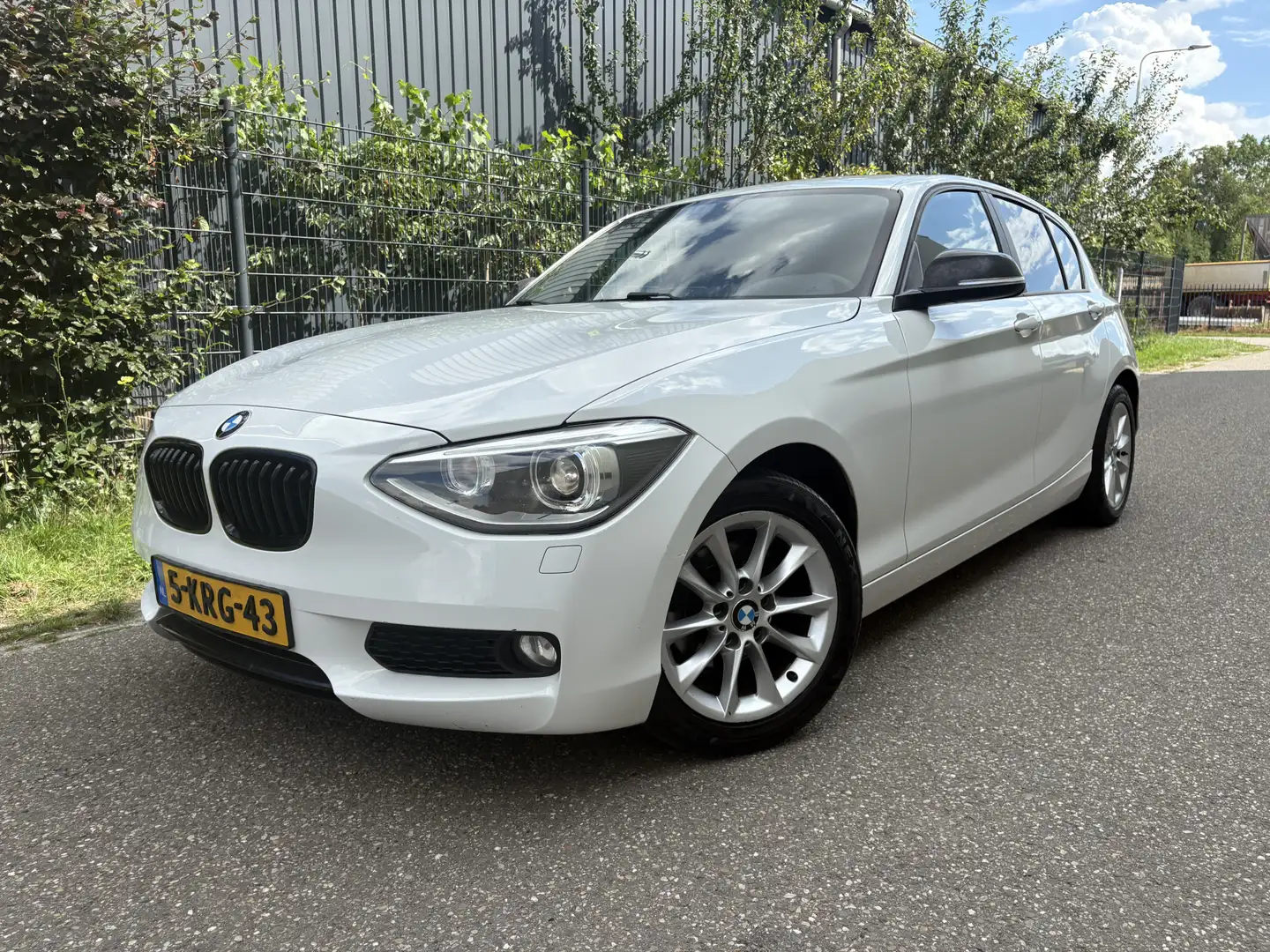 BMW 114 1-serie 114i EDE / 5- DEURS / NAVI / AIRCO / CRUIS Wit - 1