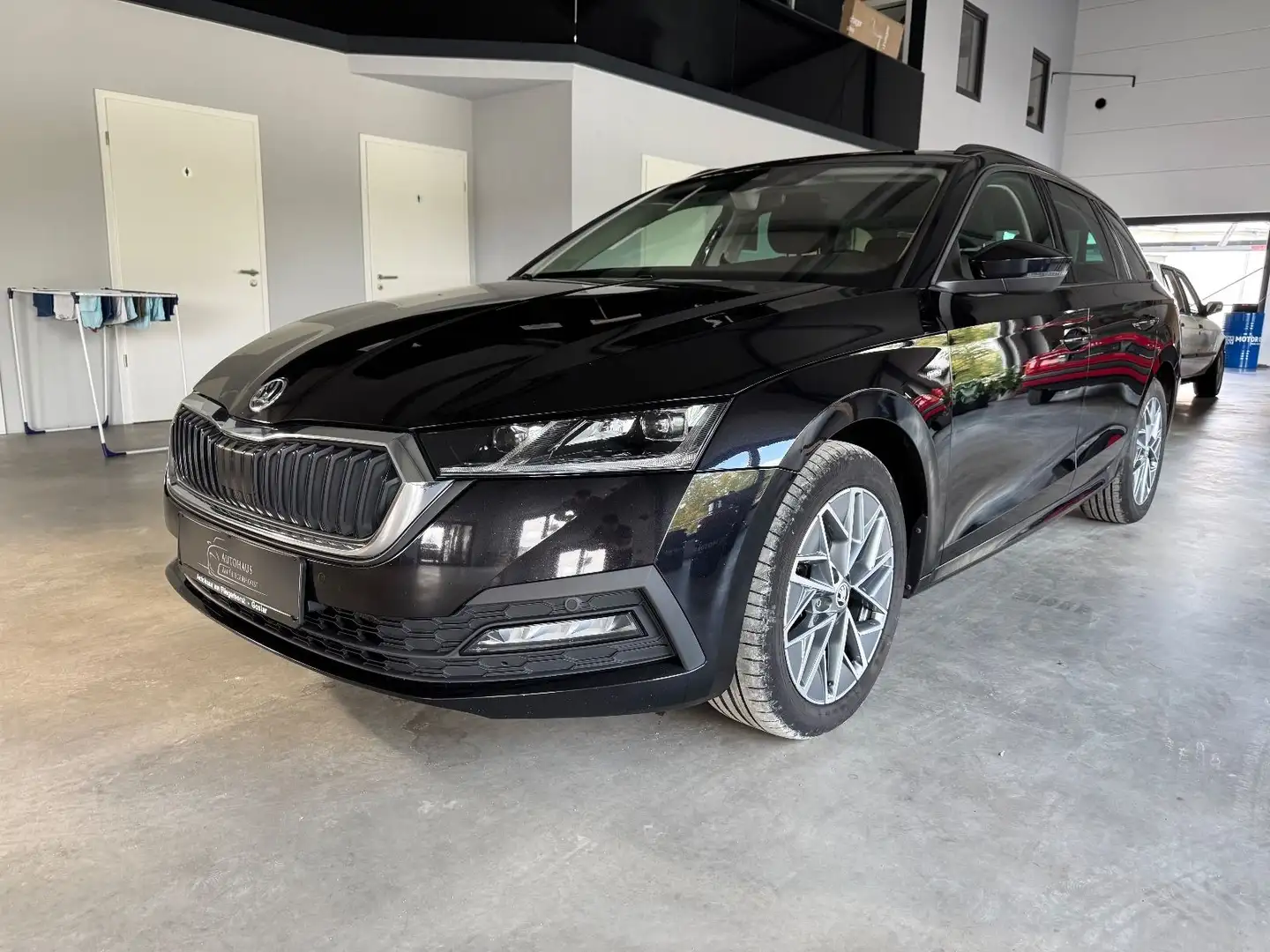 Skoda Octavia Combi 2.0 TDI Matrix-LED/ACC/AHK/SHZ/PDC Noir - 1