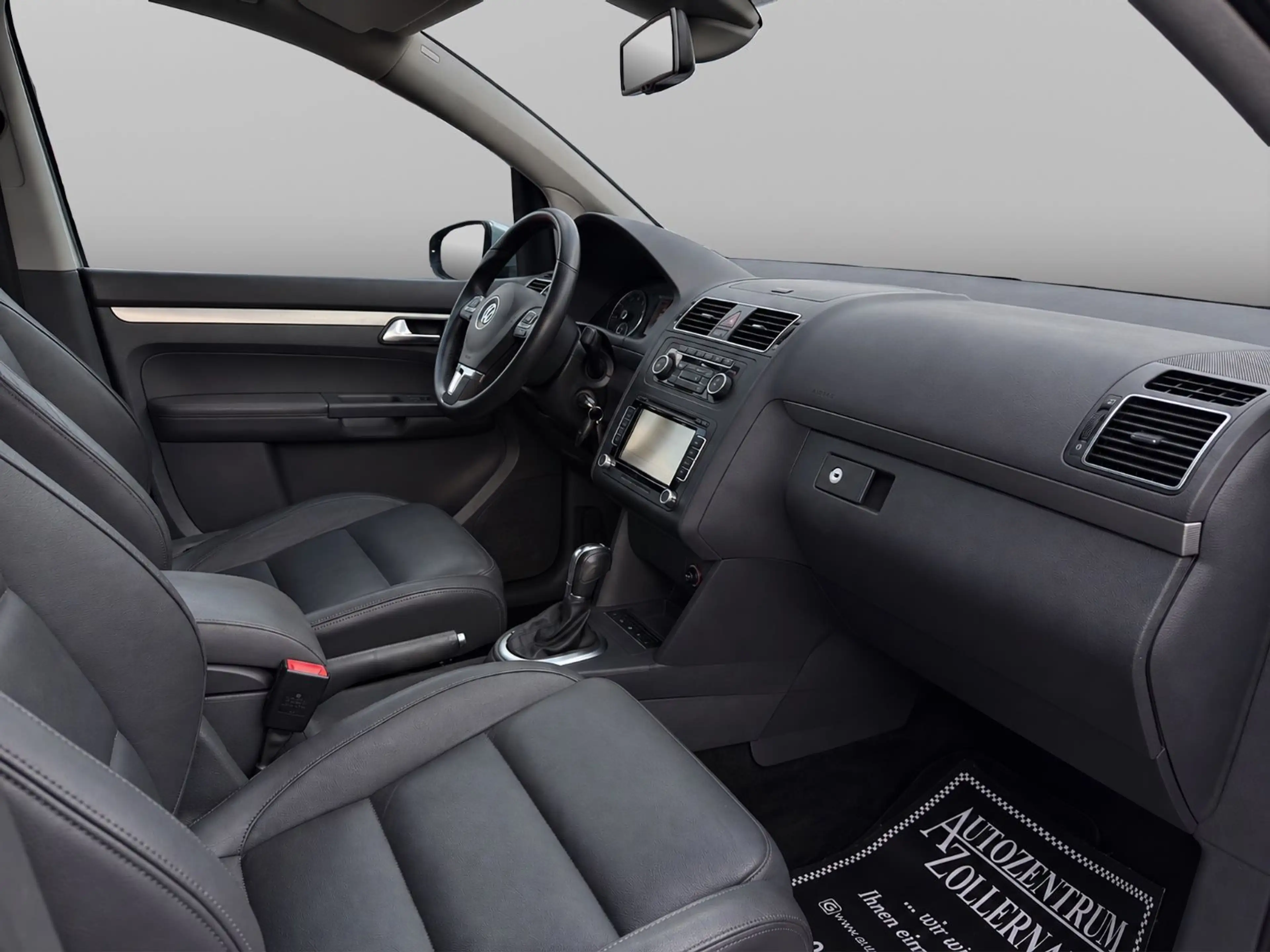 Volkswagen Touran 1.4 TSI DSG Highline *1.HAND*LEDER*RCAM* — photo 9