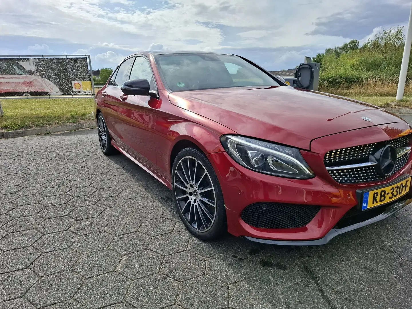 Mercedes-Benz C 180 Mercedes-Benz C-Klasse C180  AMG-Pakket 1.6 2017 R Rood - 2