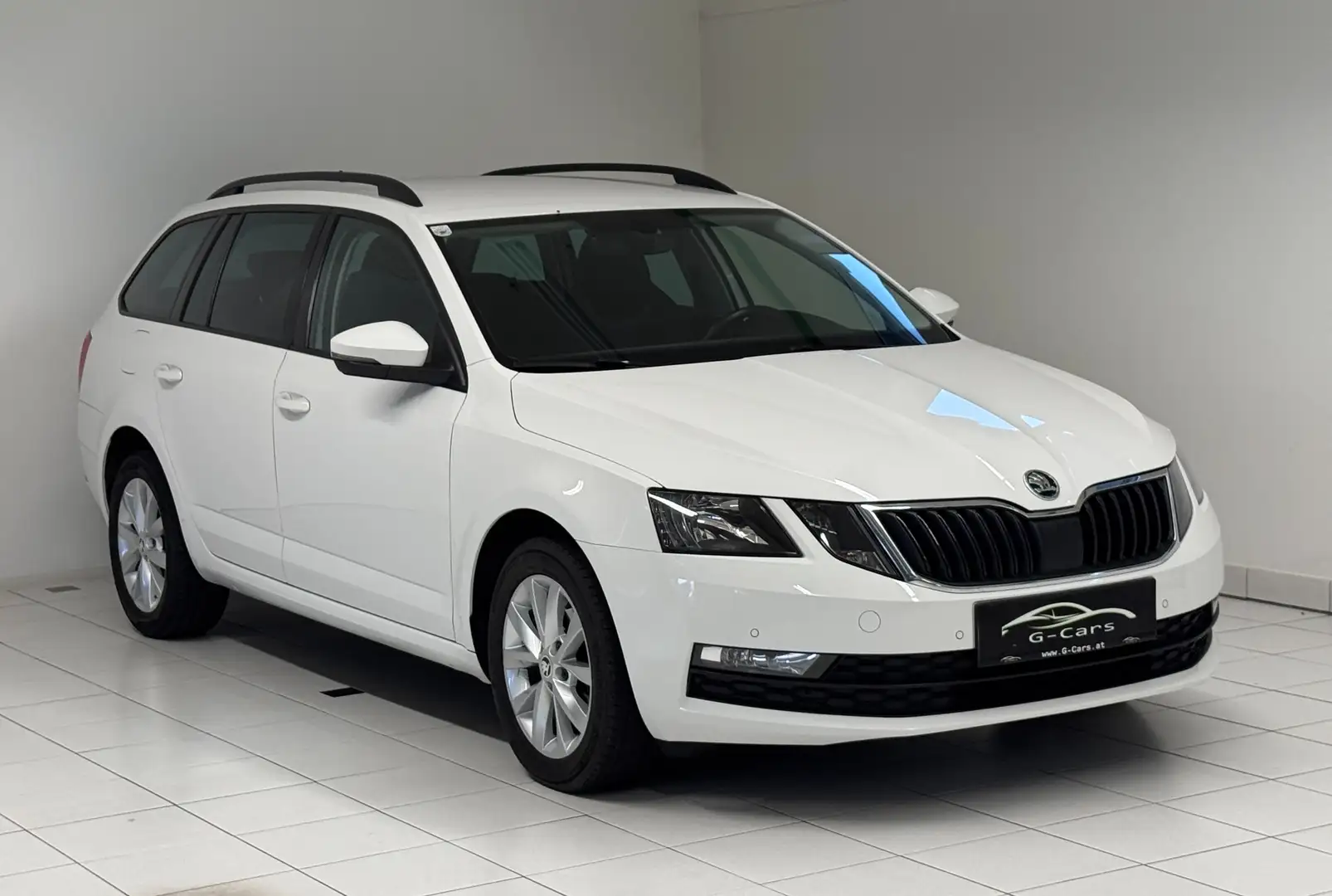 Skoda Octavia Combi 1,6 TDI Ambition *Facelift*Navi*Tempomat* Weiß - 1