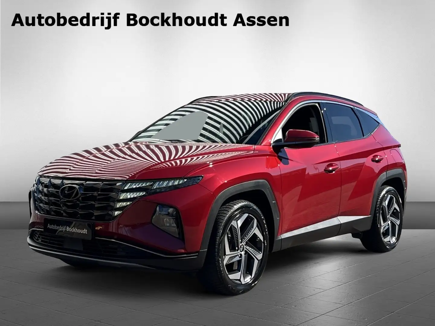 Hyundai TUCSON 1.6 T-GDI PHEV Comfort | Navigatie | Camera | Stoe Rood - 1