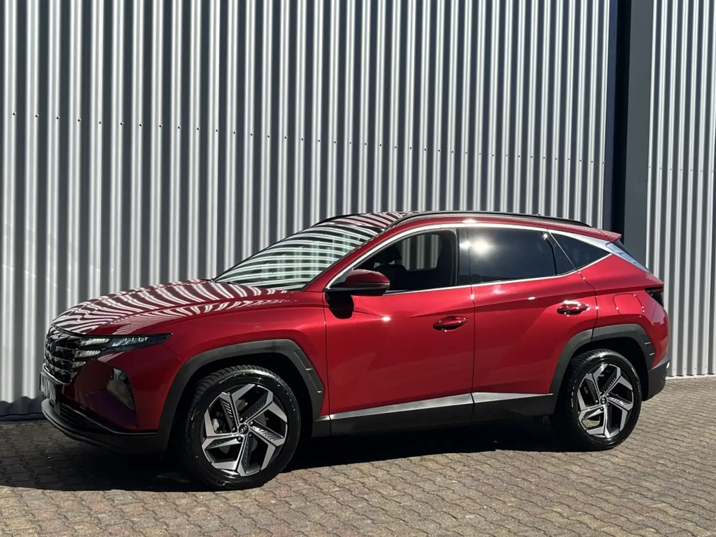 Hyundai TUCSON 1.6 T-GDI PHEV Comfort | Navigatie | Camera | Stoe Rood - 2