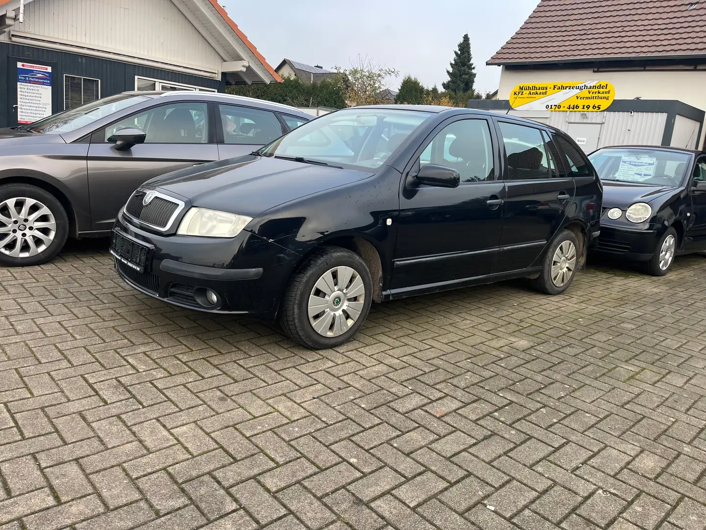 Skoda Fabia Kombi 1.2i HTP, 1. Hand, TÜV 10.2026, Kette neu Schwarz - 2