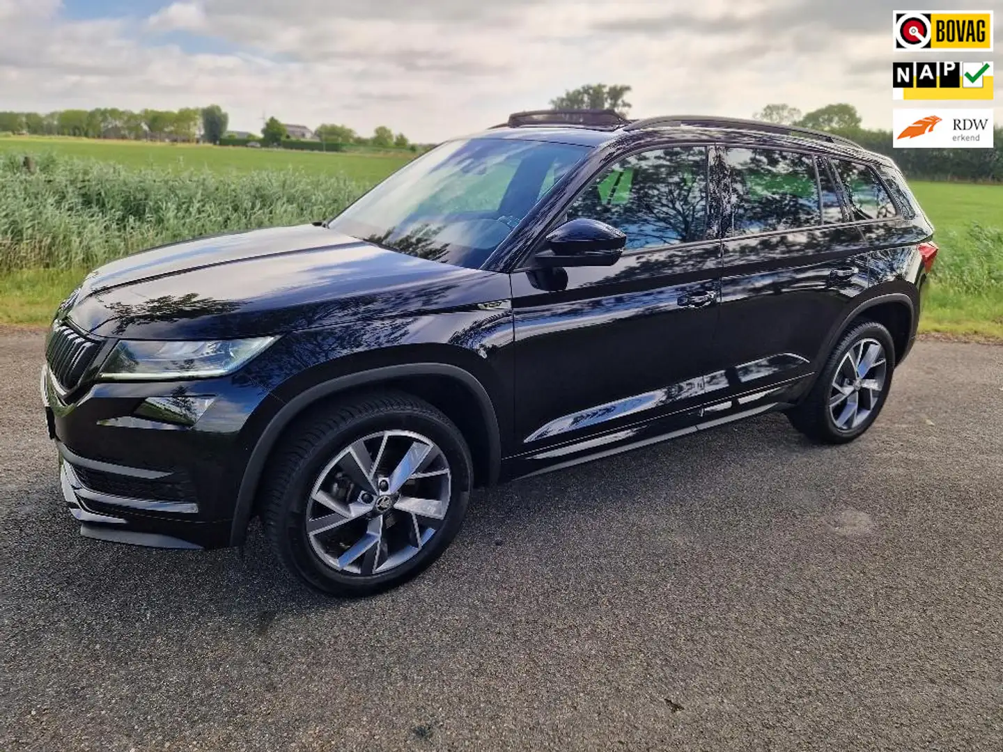Skoda Kodiaq 1.5 TSI Sportline Business, panoramadak, nieuwstaa Zwart - 1