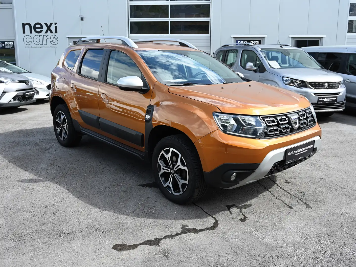Dacia Duster Duster TCe 125 S | 1.Hand | Allrad | AHK | Top! Orange - 1