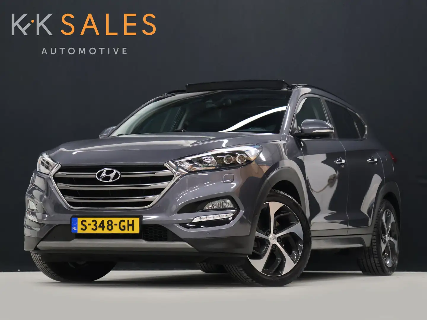 Hyundai TUCSON 1.6 T-GDi Comfort 4WD *WEEKAANBIEDING* [SCHUIFKANT Grijs - 1