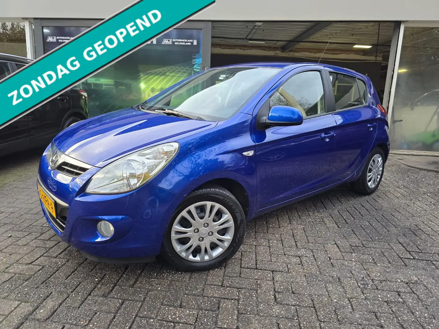 Hyundai i20 1.4i DynamicVersion | 2E EIGENAAR | 12MND GARANTIE Blauw - 1