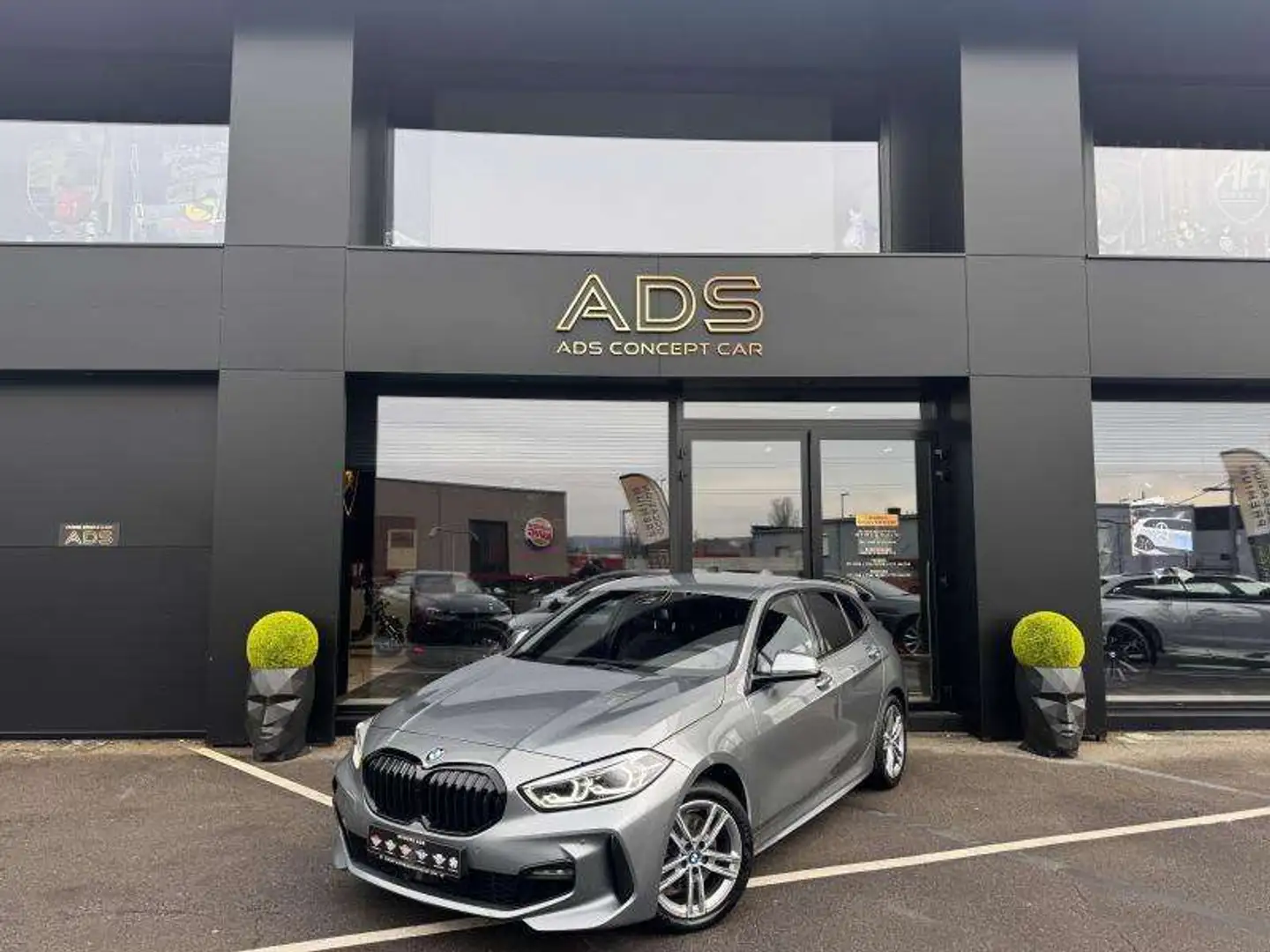 BMW 116 i pack M Grijs - 1