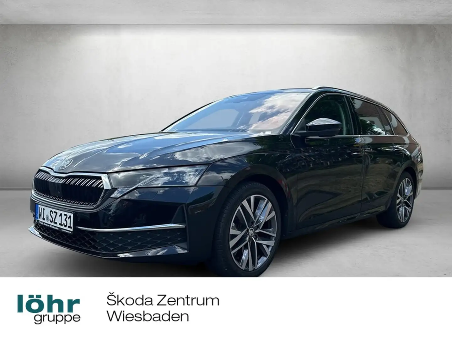 Skoda Octavia Combi Ultimate 2,0L TDI Zwart - 1