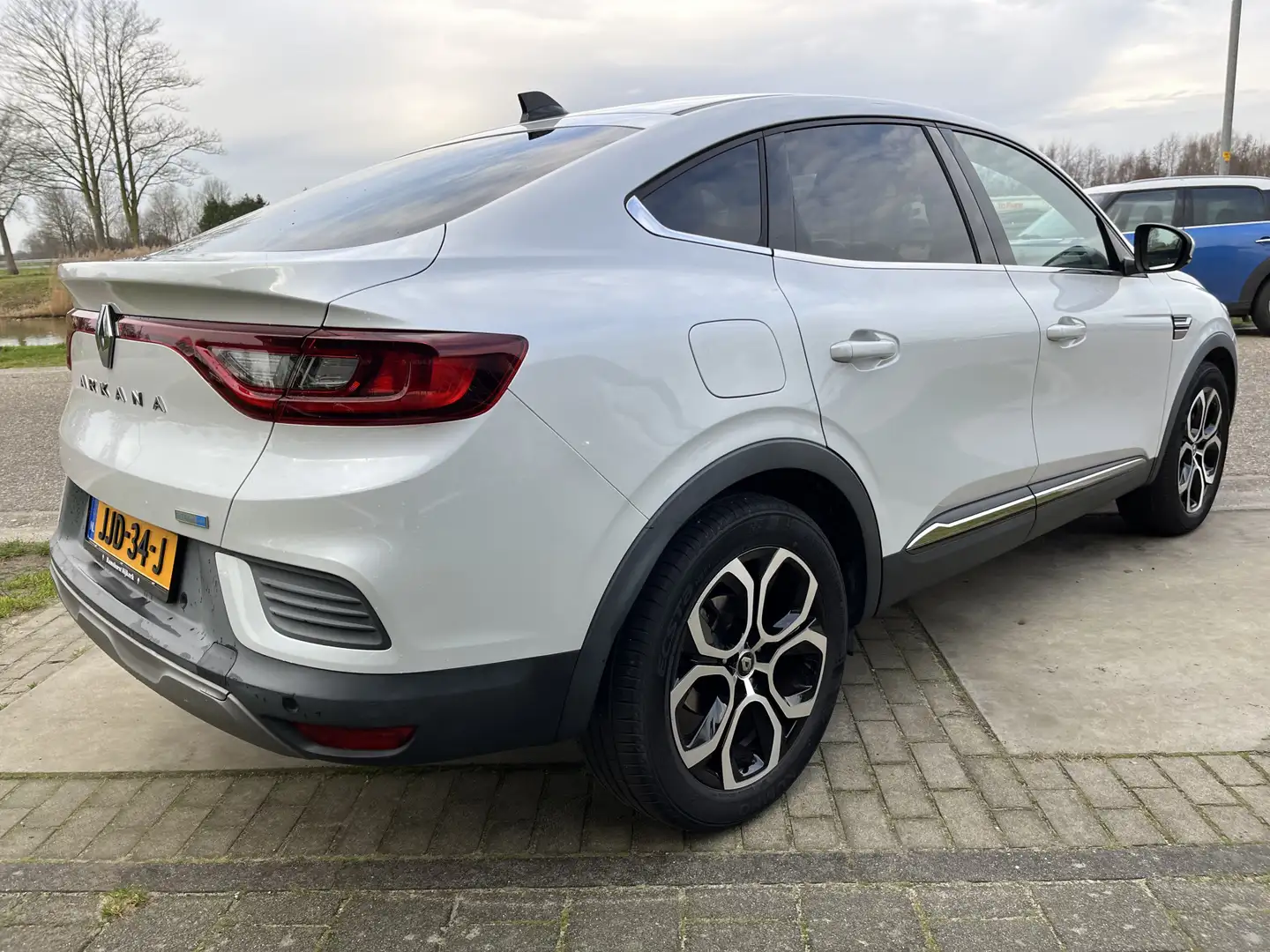 Renault Arkana 1.6 E-Tech Hybrid 145 Intens / Camera / Apple Carp Weiß - 2