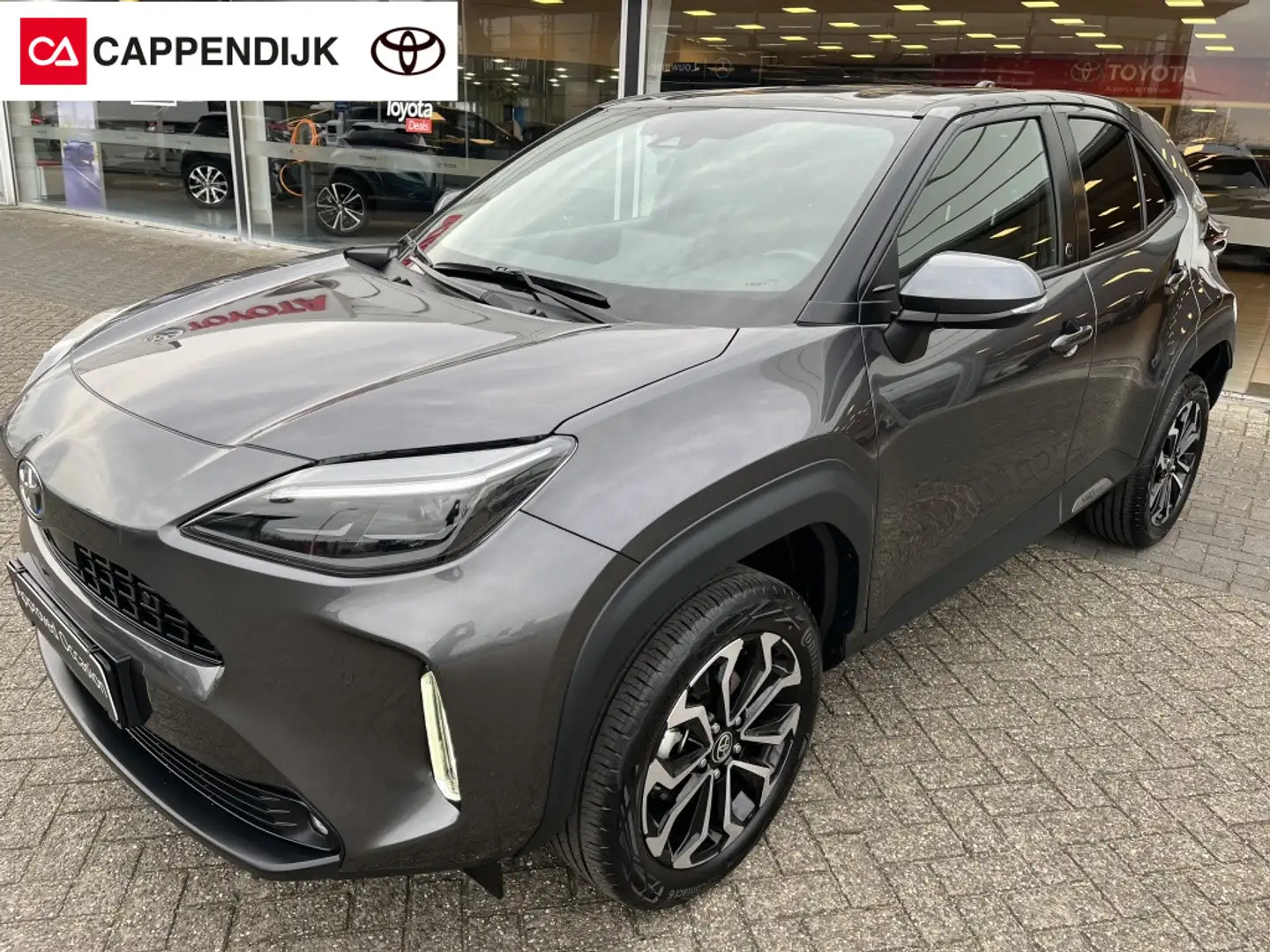 Toyota Yaris Cross | NET BINNEN | 1.5 Hybrid TEAM D | NAVI | PDC | BS Grigio - 1