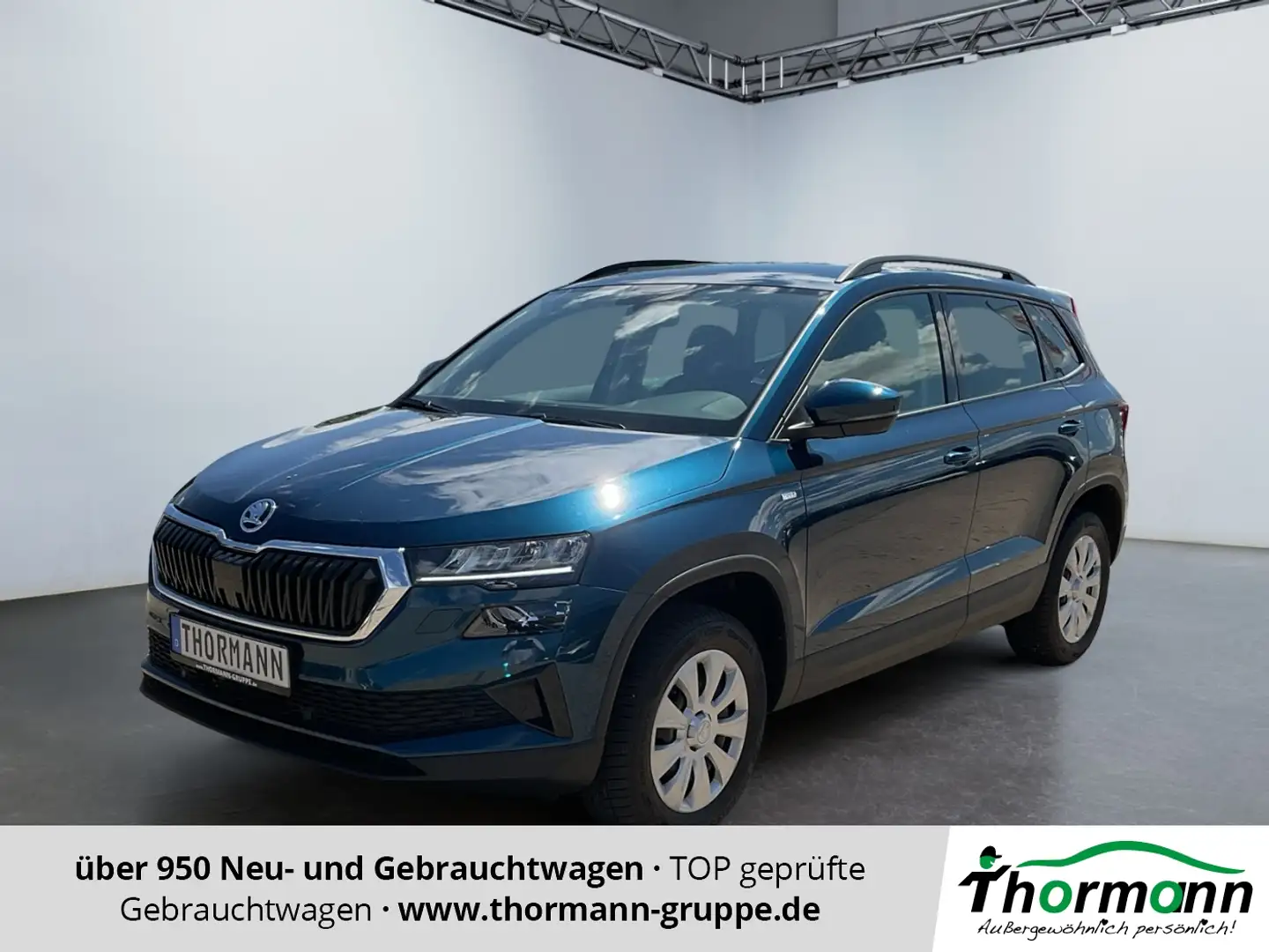 Skoda Karoq Tour 2.0 TDI ACC 4xSHZ el.Heck, Navi Blauw - 1