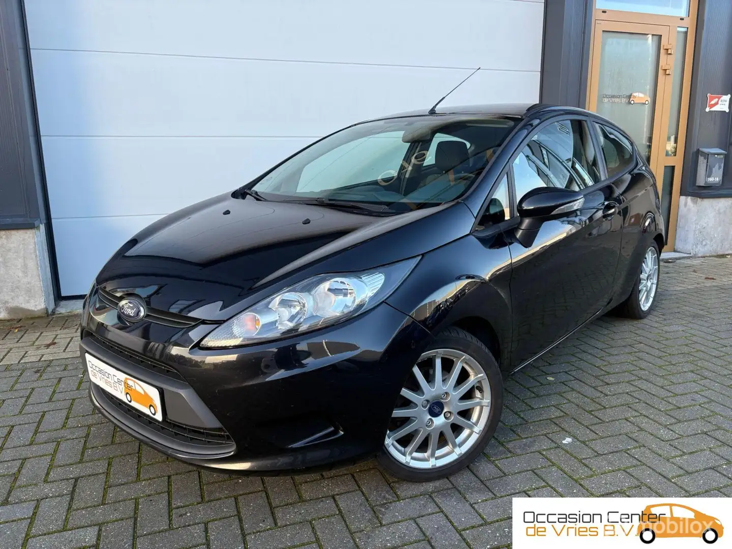 Ford Fiesta 1.25 Airco Velgen Elektrisch Pakket Bluetooth Zwart - 1