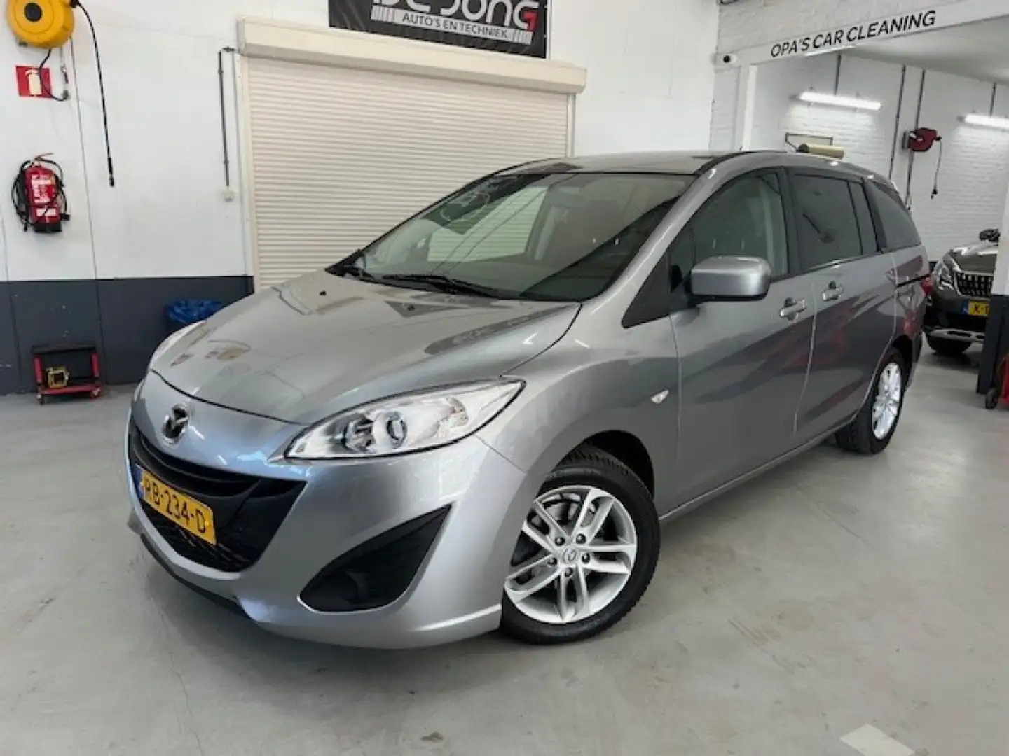 Mazda 5 2.0 6 prs, Clima, Media radio, Trekhaak, Cruise Ct Gris - 1