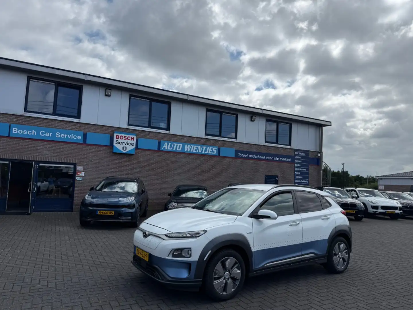 Hyundai KONA EV Premium 64kWh | SOH 100% | Leer | Navi Rood - 2