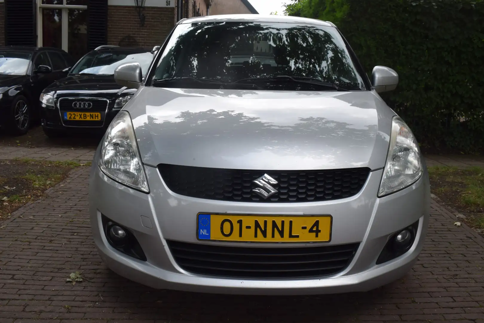 Suzuki Swift 1.2 Exclusive EASSS Airco/Cruise/St.Verw. Zilver - 2