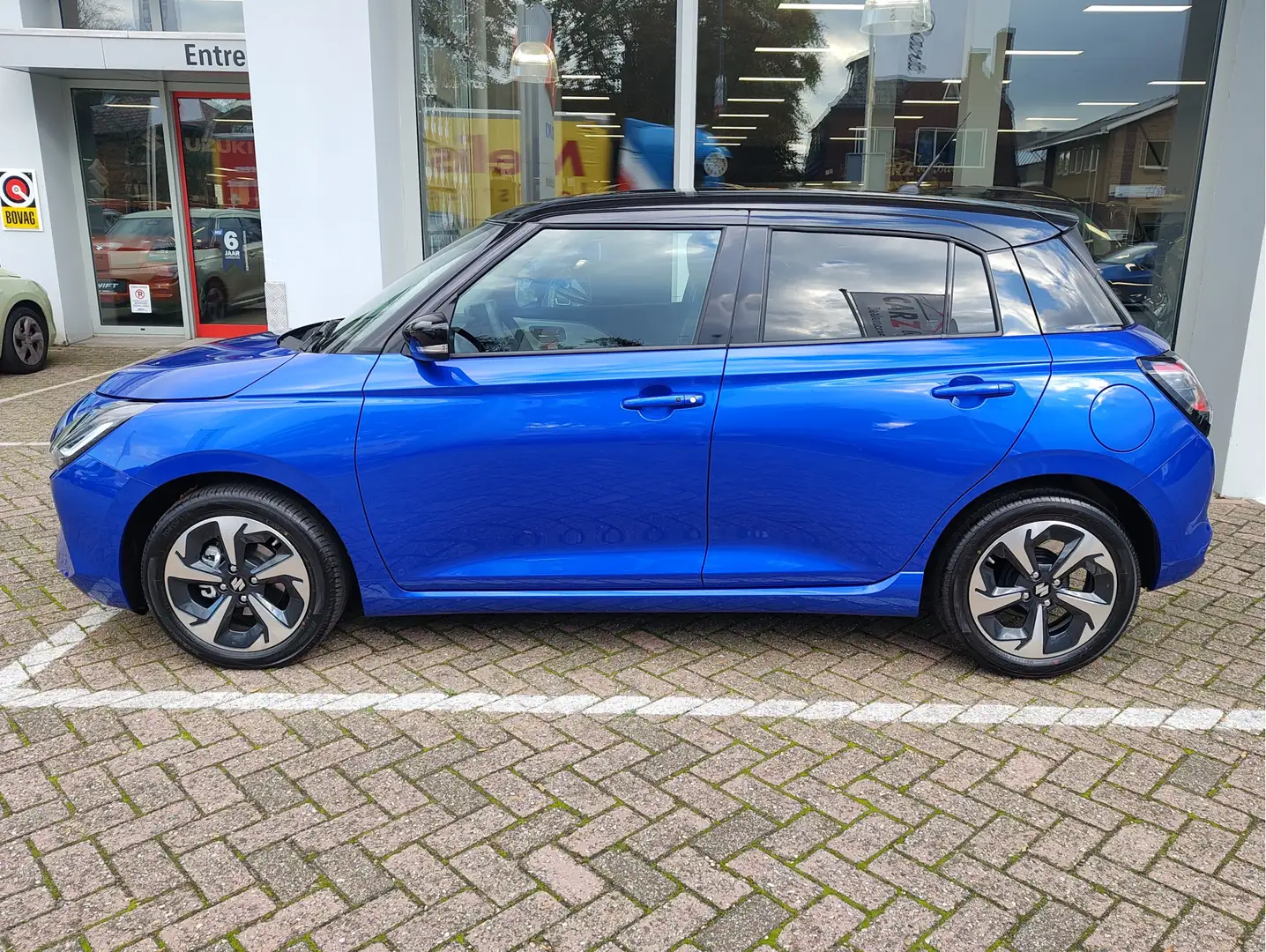 Suzuki Swift 1.2 STYLE SMART HYBRID AUTOM. | DEMO DEAL! | Garan Blauw - 2