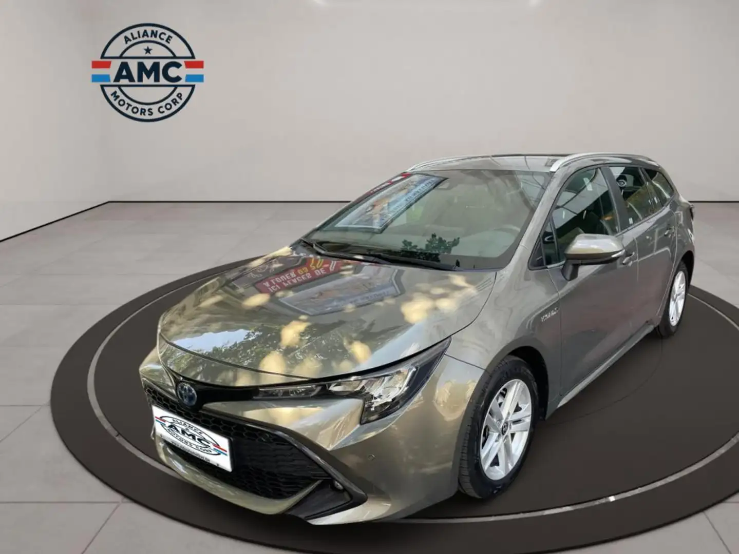 Toyota - 01/2021 59 336 KMS 1.8 HYBRID DYNAMIC E-CVT Busi Bronz - 1