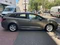 Toyota Corolla TS 1.8 HYBRID DYNAMIC E-CVT Business Brons - thumbnail 4
