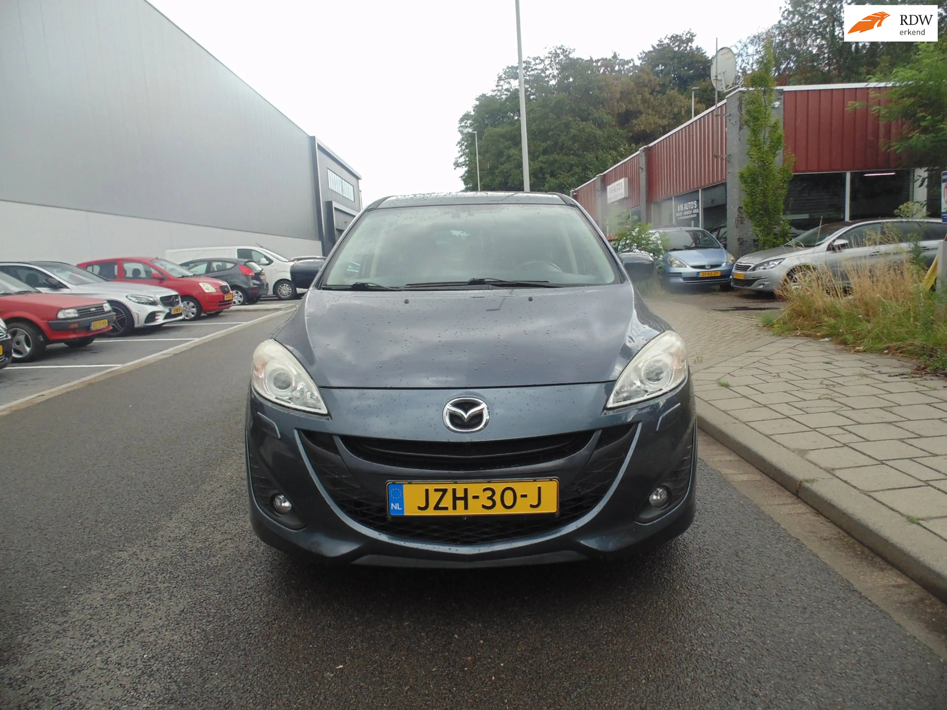 Mazda 5 2.0 Business 7 set met N avi airco leder 2011