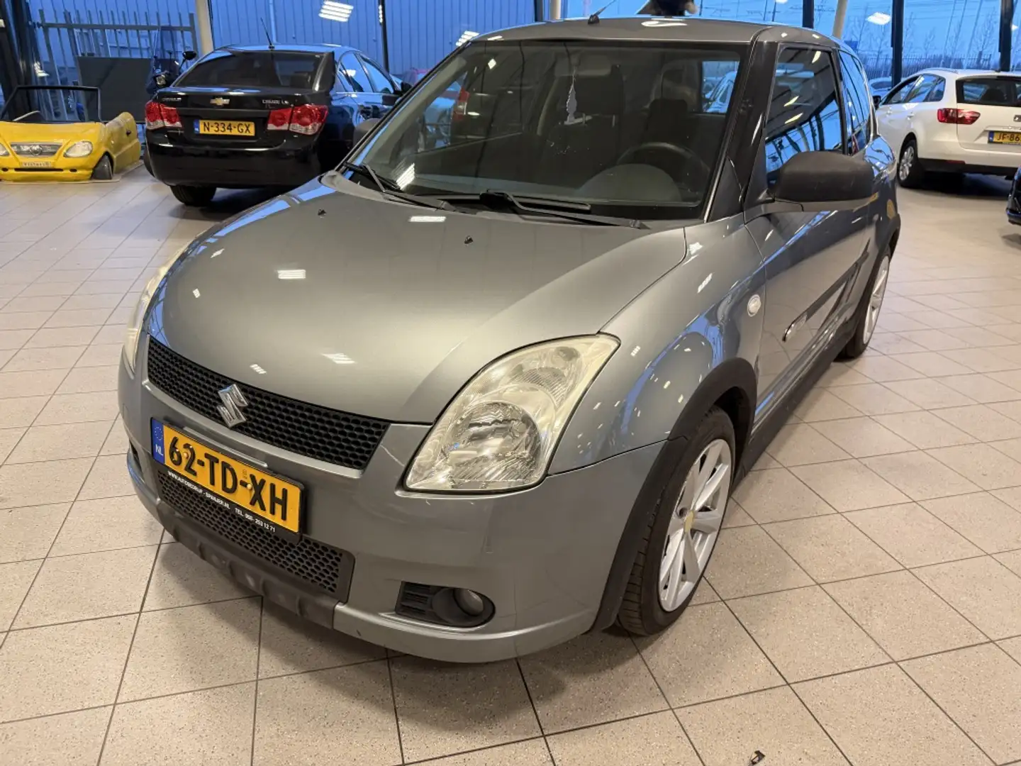 Suzuki Swift 1.3 GLS Grau - 2