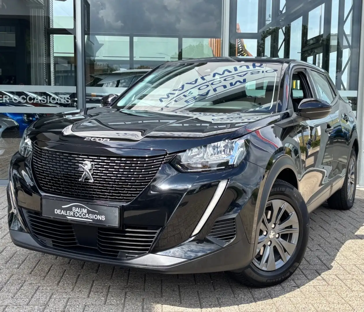 Peugeot 2008 1.2 PT ACTIVE PACK AIRCO CRUISE CARPLAY PDC. Zwart - 1