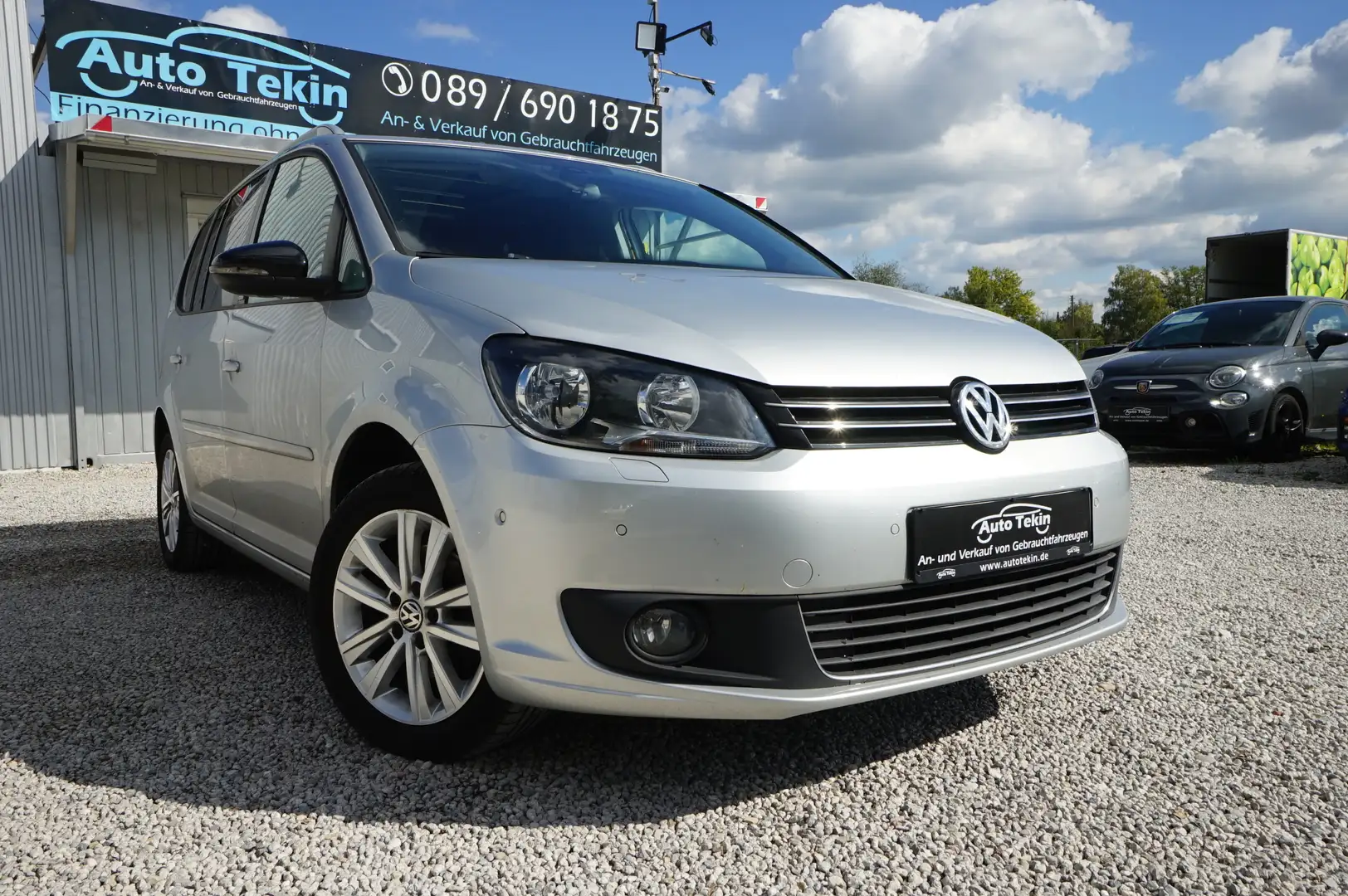 Volkswagen Touran 1.4 TSI Style |7-Si.| |Navi| |Panorama| Silber - 1