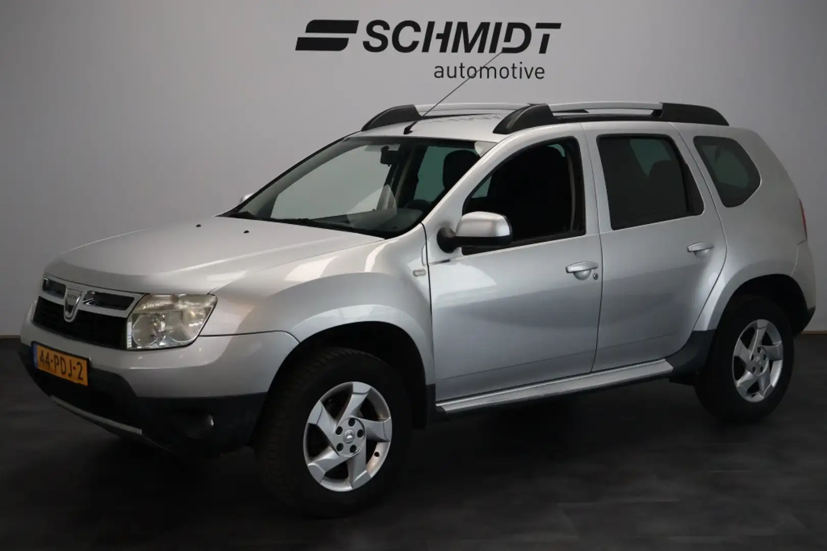 Dacia Duster 1.6 Lauréate 2wd 105pk | Trekhaak | Airco | Elektr Gris - 1