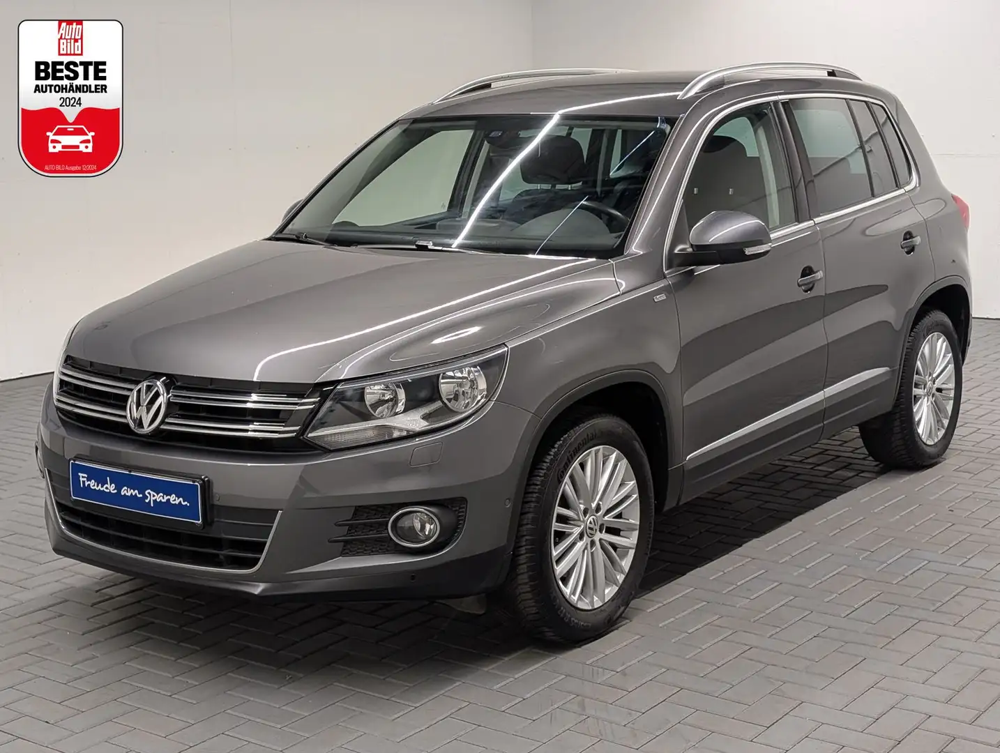 Volkswagen Tiguan Sport&Style AHK/Navi/Kam/SHZ/PDC/17 LM Grau - 1