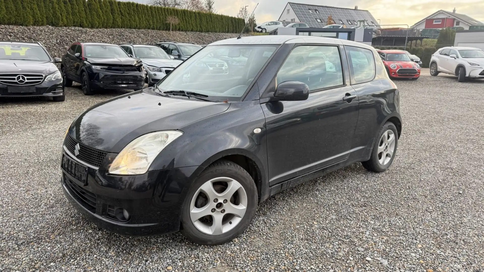 Suzuki Swift 1.5 Lim. Comfort Zwart - 1