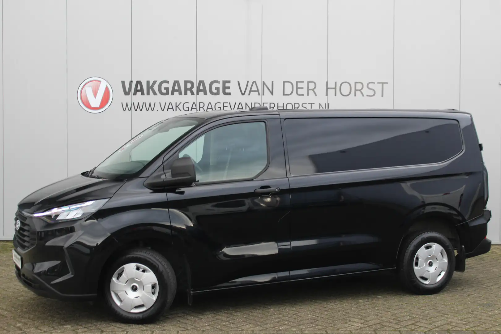 Ford Transit Custom 320 2.0 136 pk TDCI L1H1 Trend Fab.Gar. tot 10-202 Zwart - 1