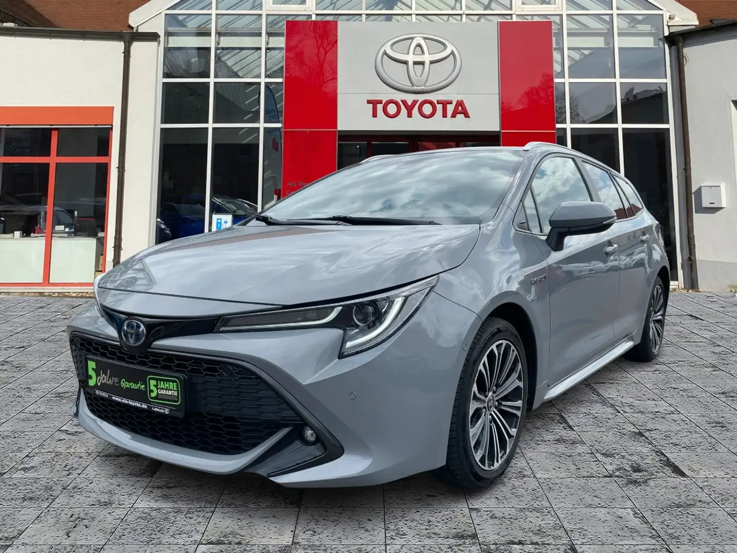 Toyota Corolla TS 2.0 Hybrid Team D AHK*Navi*KAM*SHZ*DAB Grijs - 2