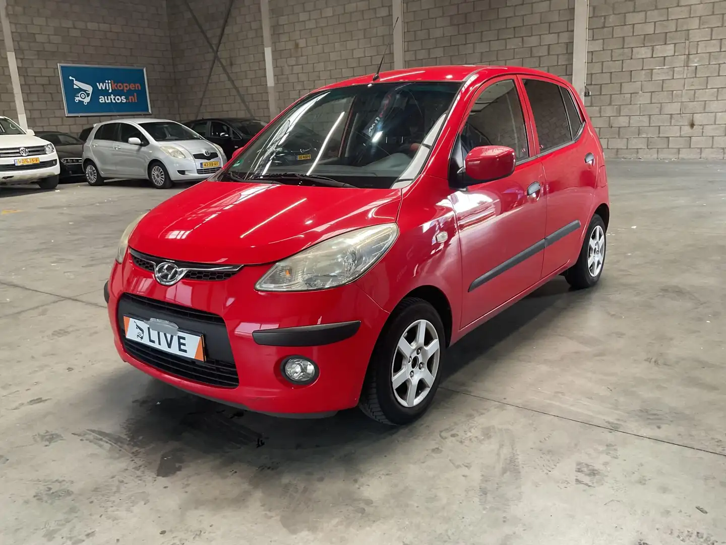 Hyundai i10 1.25i Dynamic Cool Airco, Sportvelgen, el ramen Rosso - 1