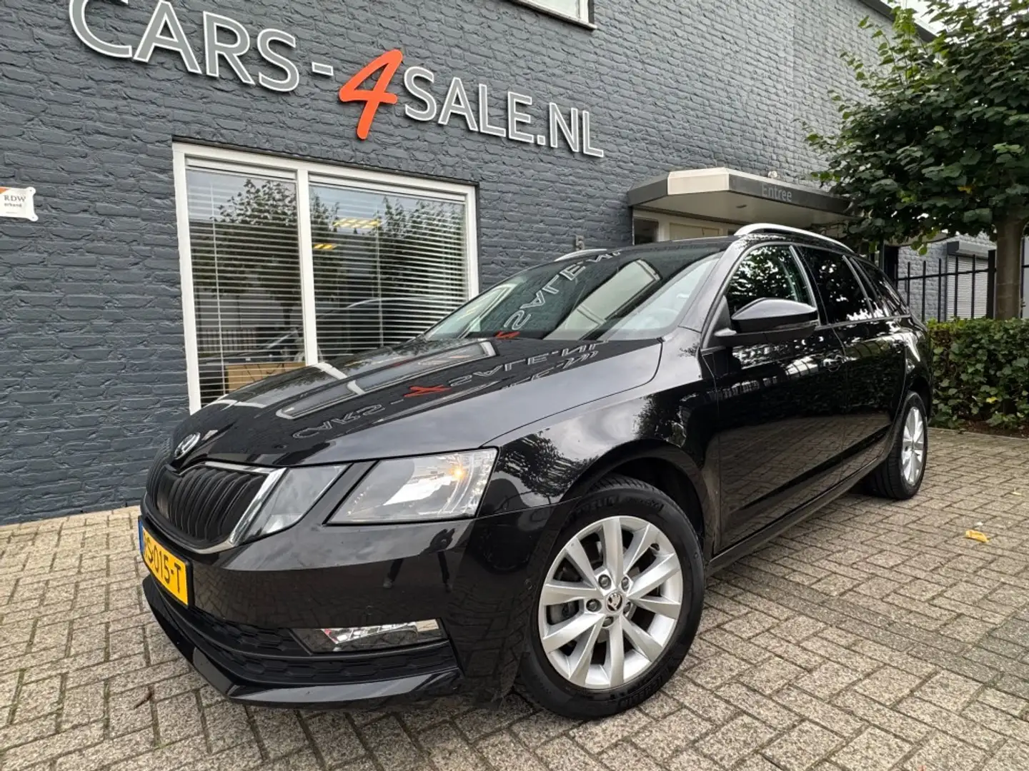 Skoda Octavia 1.6 TDI Ambition Business + Ecc + Lmv + Navi + par Schwarz - 1