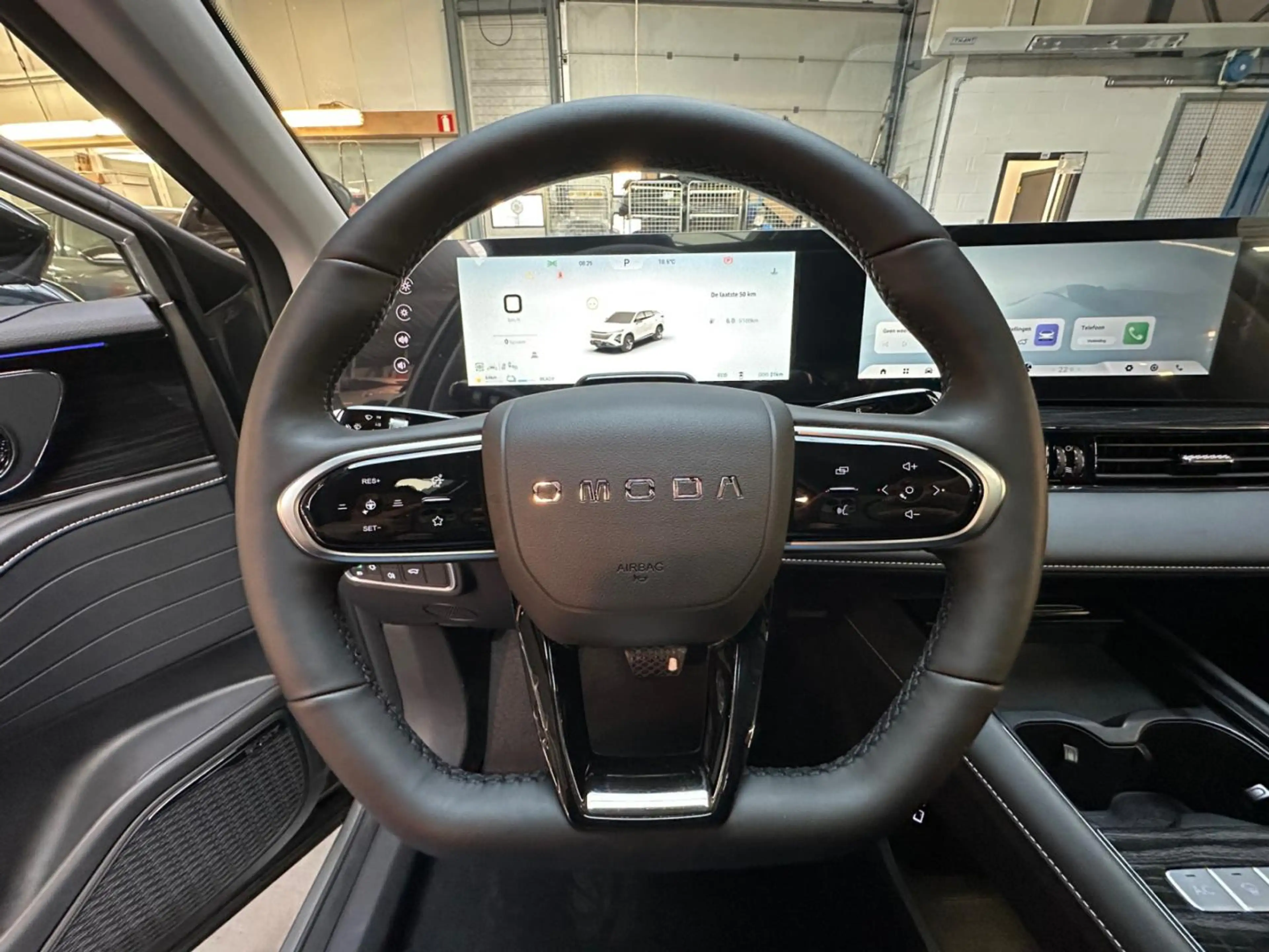 Omoda 5 HEV PREMIUM — photo 11