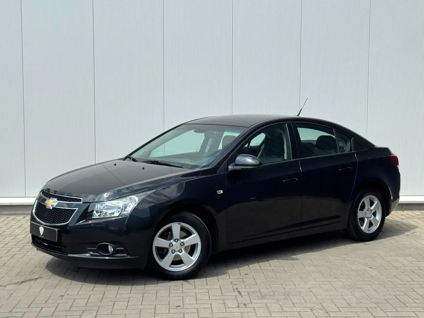 Chevrolet Cruze ✅1.6i GARANTIE Airco Navi CruiseC Parksens 1.Eig Noir - 1