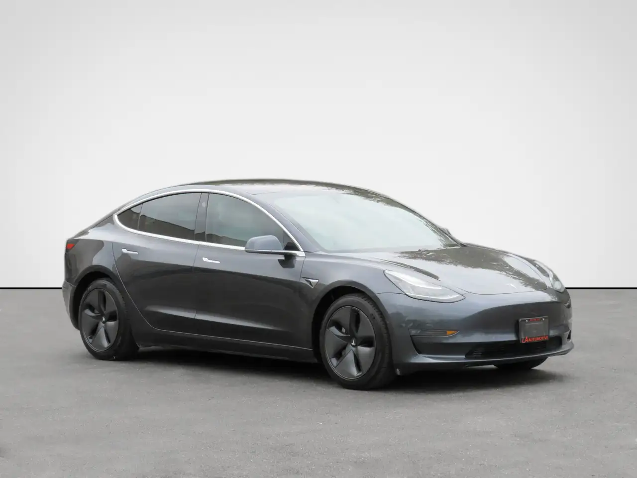 Tesla Model 3 photo Tesla Model 3