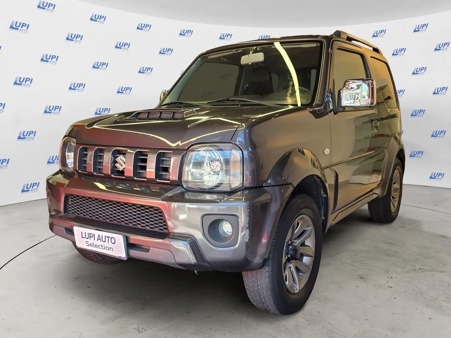 Suzuki Jimny 1.3 vvt Evolution+ 4wd auto Grigio - 1