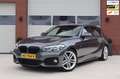 BMW 118 1-serie 118i M Sport Executive Shadowline - Groot Grijs - thumbnail 1