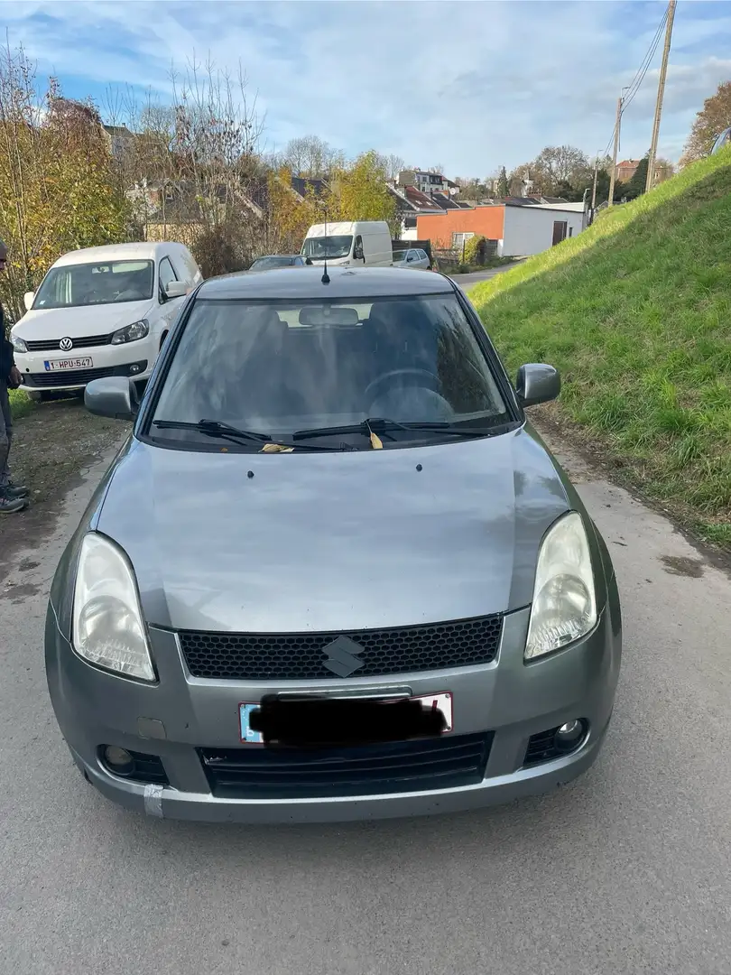 Suzuki Swift 1.3 DDiS GLX - 1